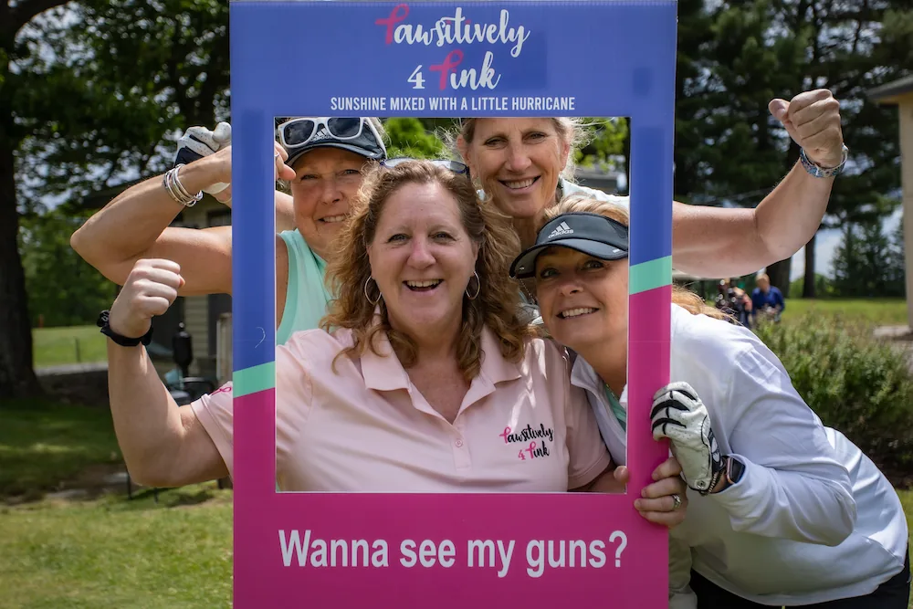 Michelle, the founder of breast cancer nonprofit Pawsitively 4 Pink, at one of our fundraising events with other donors to fundraise for women with breast cancer at her nonprofit organization in Massachusetts.