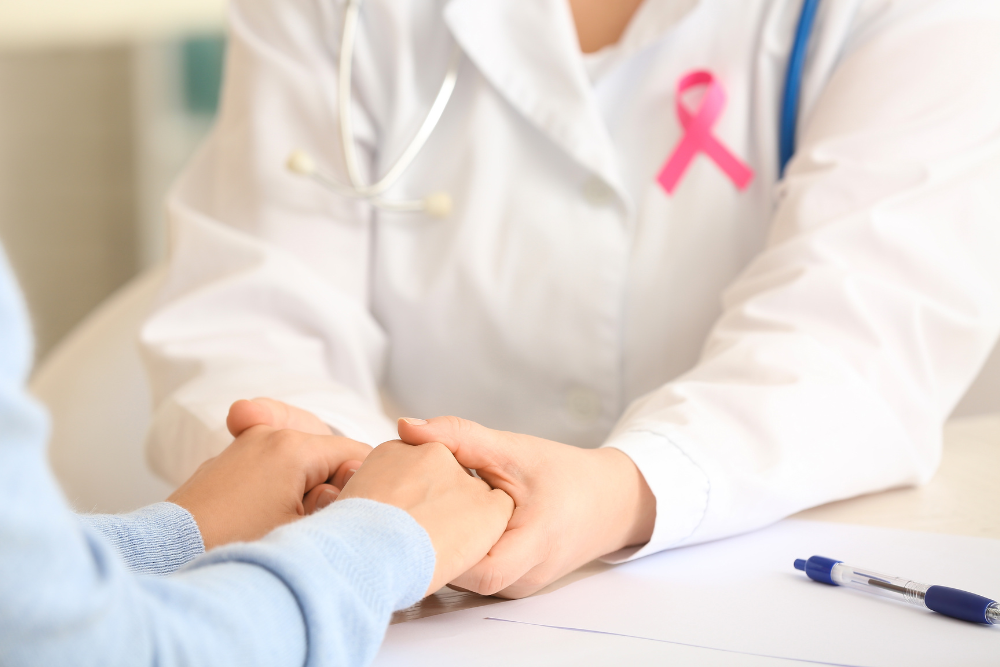 A doctor talking to her patient about breast cancer